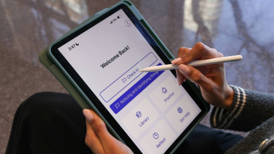 woman scrolling through phone